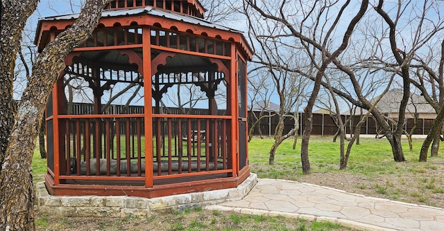 view of yard with fence and a gazebo