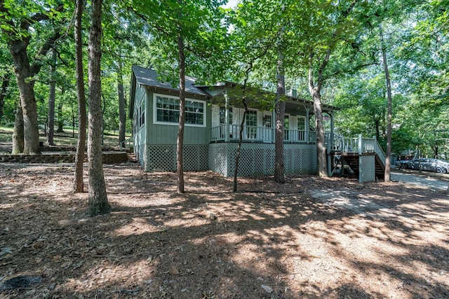 2682 Holly Trl E, Holly Lake Ranch, TX 75765 - view of front of home with a porch and stairway