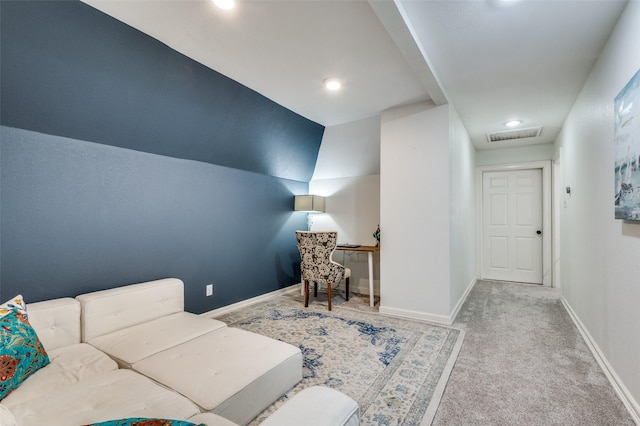 living area featuring baseboards, carpet floors, and visible vents