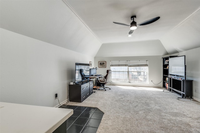 office with baseboards, lofted ceiling, ceiling fan, and dark carpet