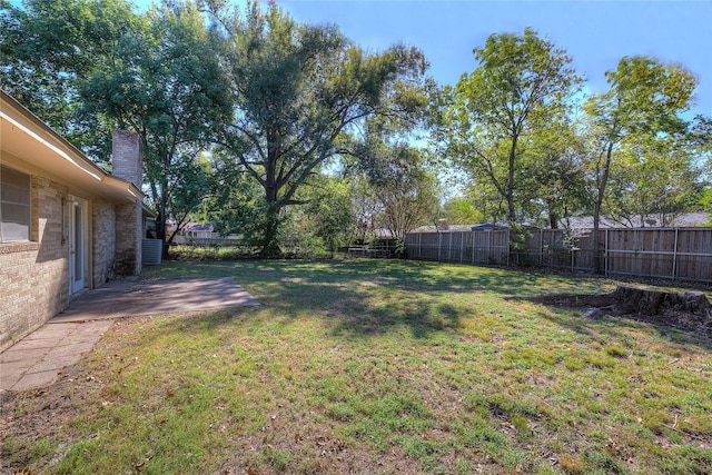 view of yard featuring a fenced backyard and a patio