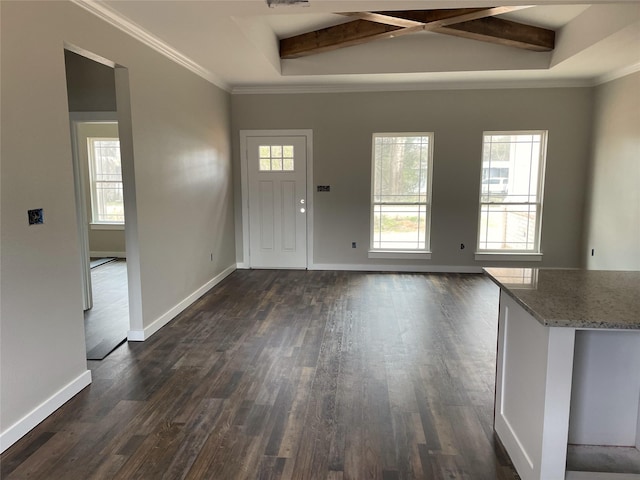 foyer entrance featuring baseboards, dark wood-style flooring, and beamed ceiling