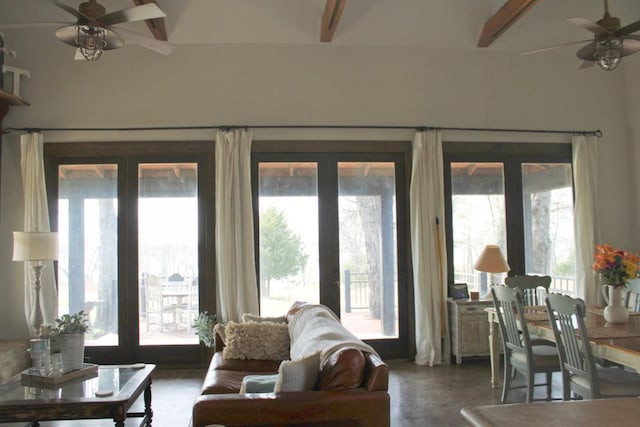 interior space featuring ceiling fan and beam ceiling