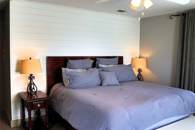 bedroom featuring visible vents