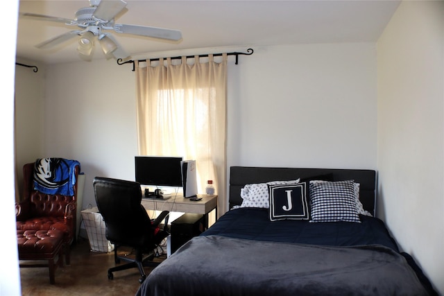 bedroom with finished concrete flooring and ceiling fan