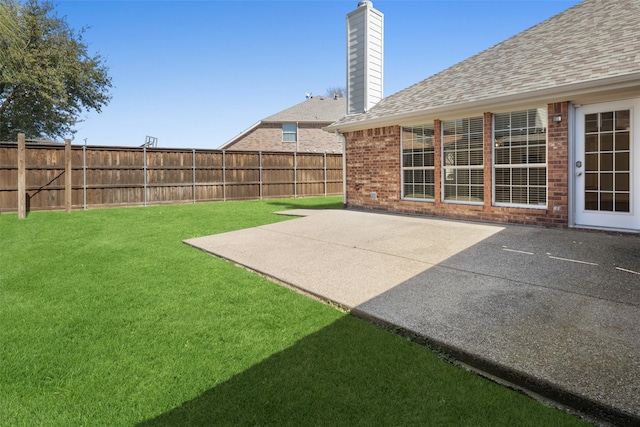 view of yard with a patio area and fence