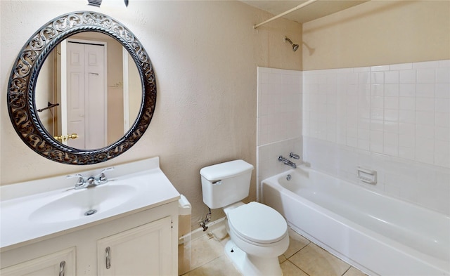 bathroom featuring shower / bath combination, a textured wall, toilet, tile patterned flooring, and vanity