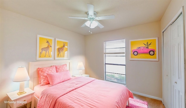 bedroom featuring carpet floors, a closet, a ceiling fan, and baseboards