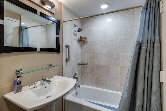 full bath with shower / tub combo and a sink