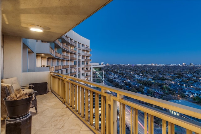 balcony featuring a city view