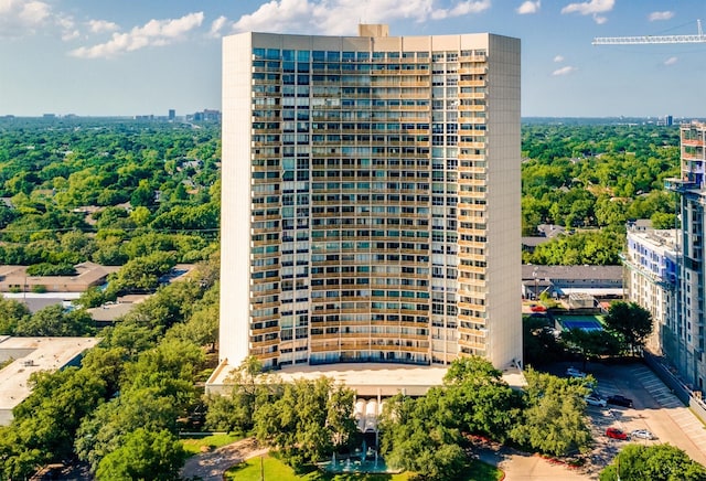 view of building exterior featuring a city view