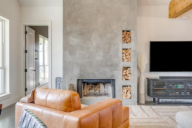 living room with a large fireplace