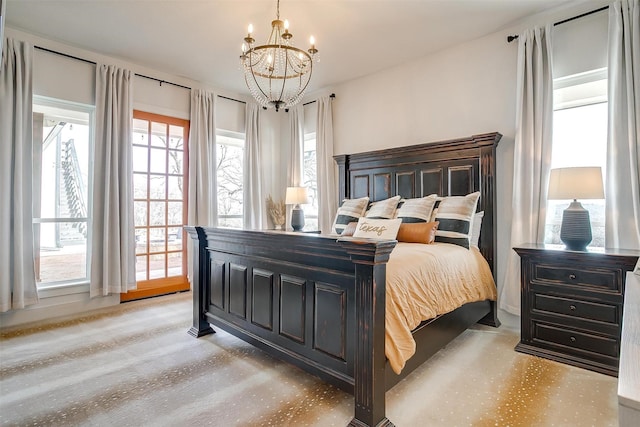 bedroom with a notable chandelier