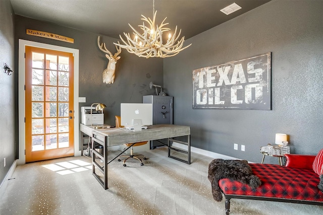 office area featuring an inviting chandelier, baseboards, and visible vents