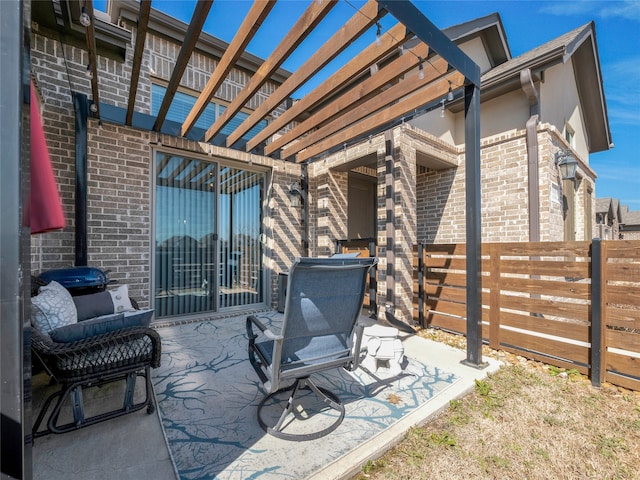 view of patio featuring fence