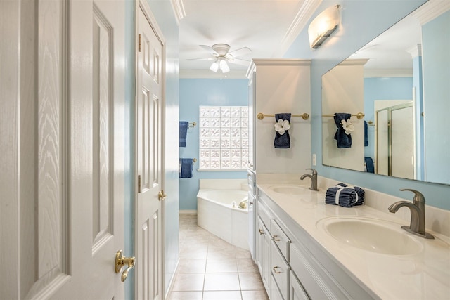 9705 Whitney Ct, Granbury, TX 76049 - bathroom with crown molding, a ceiling fan, a garden tub, double vanity, and a shower stall
