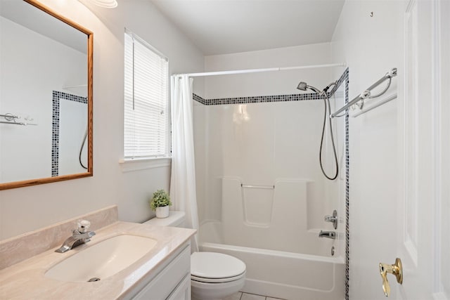 bathroom with toilet, shower / bath combo, and vanity