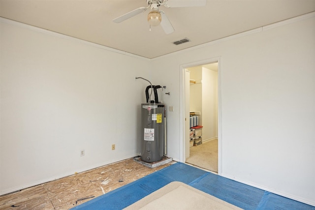 interior space featuring water heater and visible vents