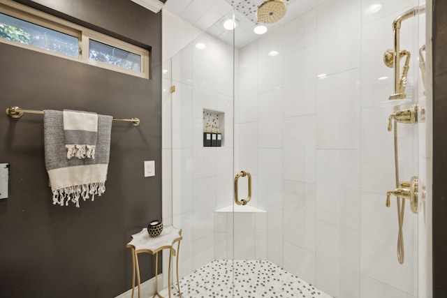 bathroom with a shower stall