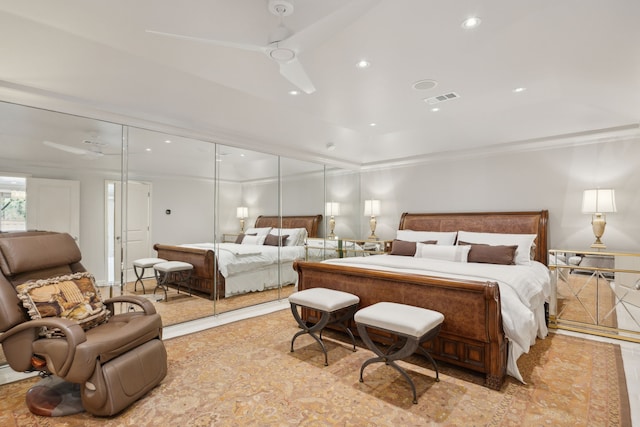 bedroom with ornamental molding, recessed lighting, and visible vents