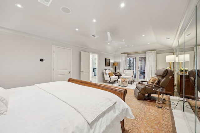 bedroom featuring lofted ceiling, french doors, ornamental molding, and visible vents