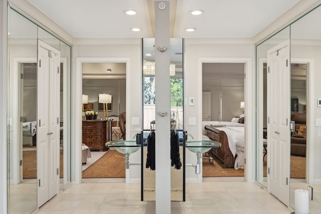 walk in closet featuring french doors