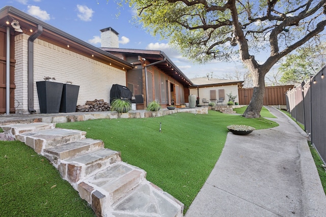 view of yard with fence