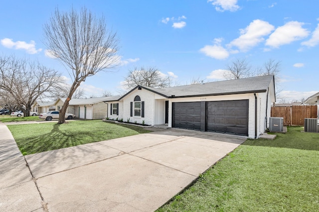 view of front of property featuring cooling unit, fence, driveway, and an attached garage