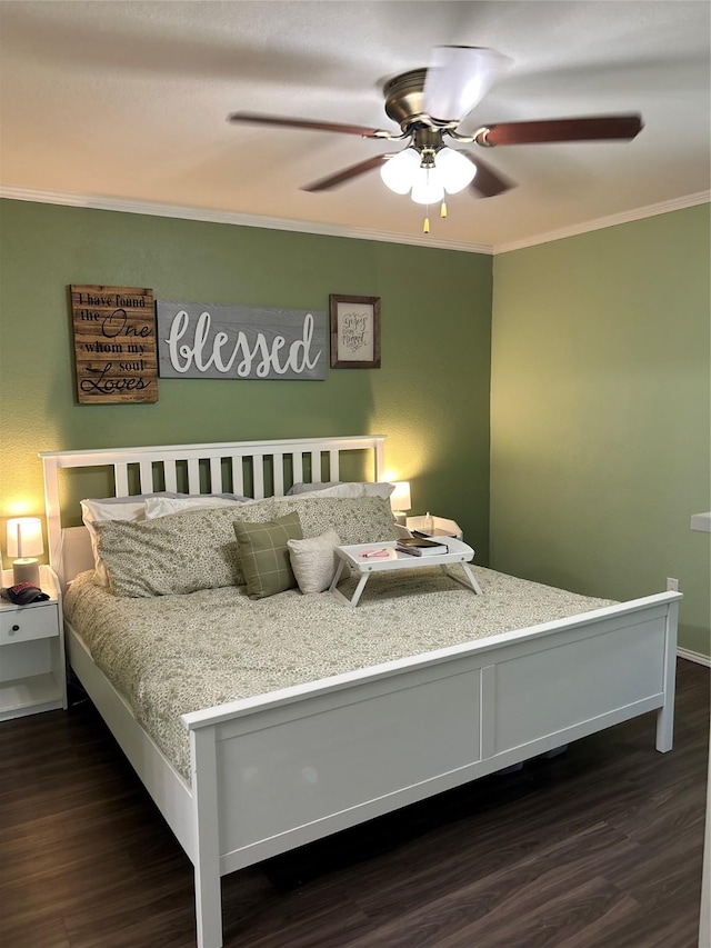 bedroom with a ceiling fan, dark wood-style flooring, and ornamental molding