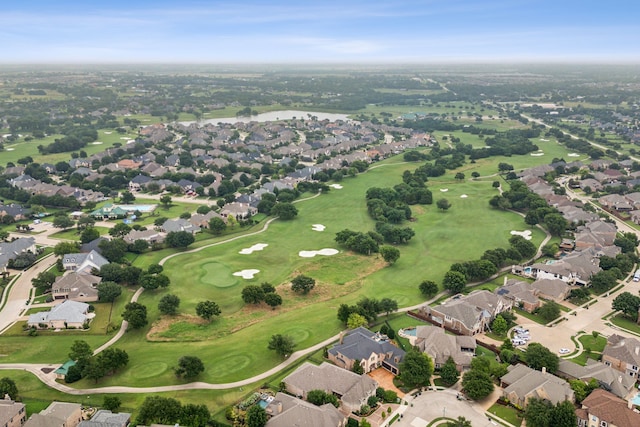 bird's eye view featuring view of golf course and a residential view