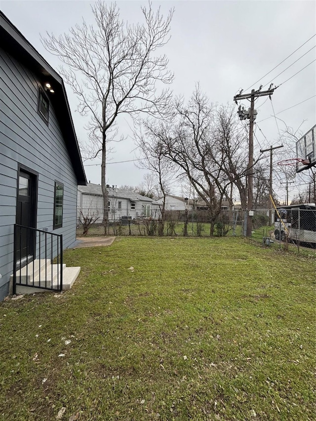 view of yard featuring fence