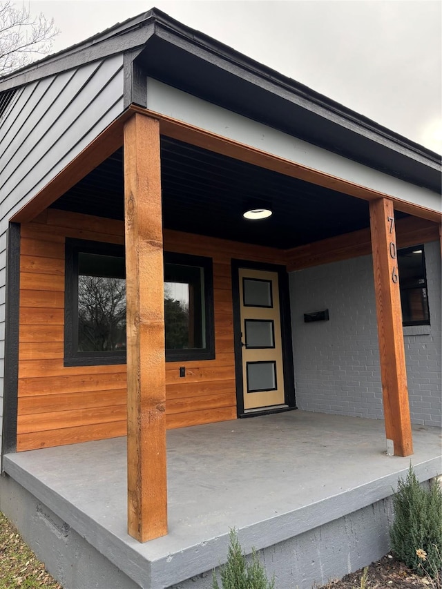 entrance to property with a porch