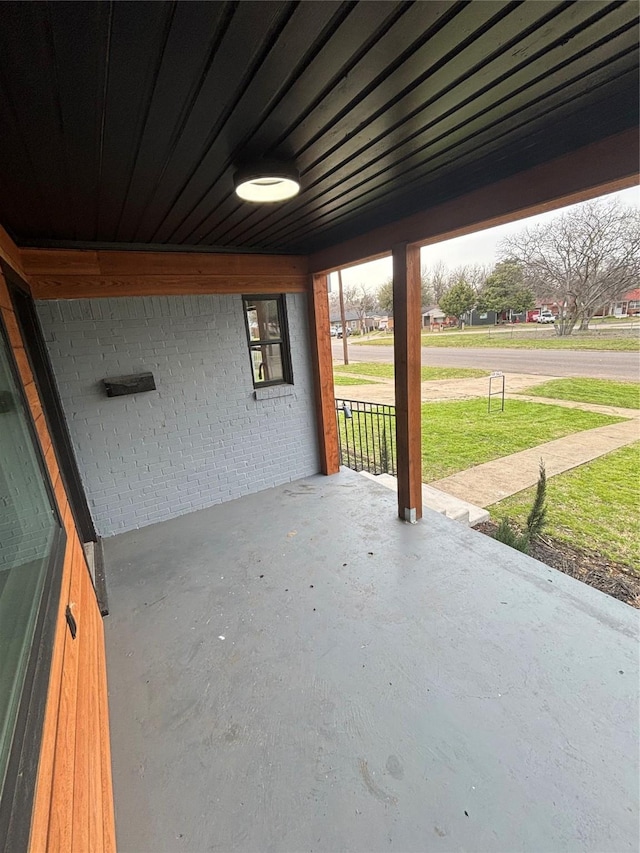 view of patio / terrace featuring an attached carport