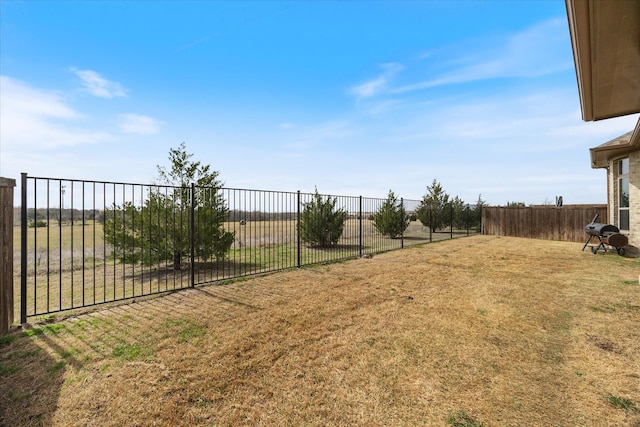 view of yard featuring fence