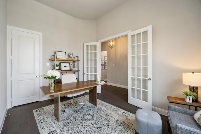 office area featuring french doors, baseboards, and wood finished floors