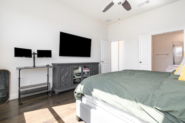 bedroom featuring visible vents, ceiling fan, baseboards, and wood finished floors