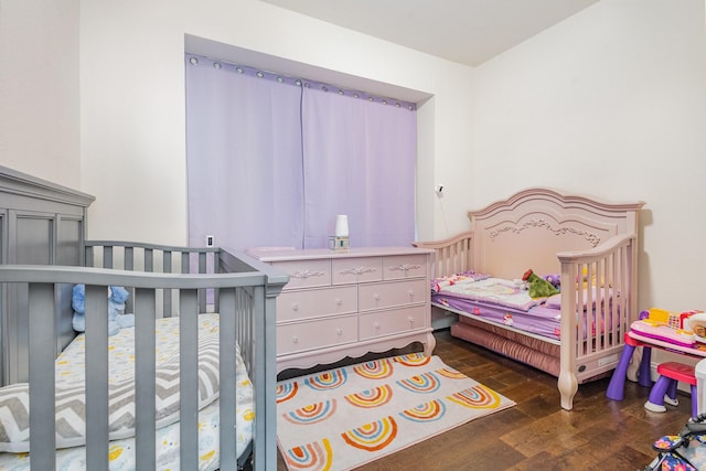 bedroom with wood finished floors