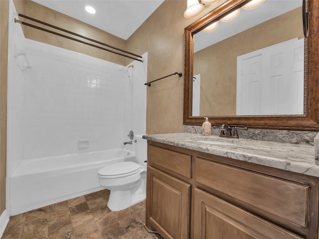 full bath with shower / tub combination, vanity, and toilet