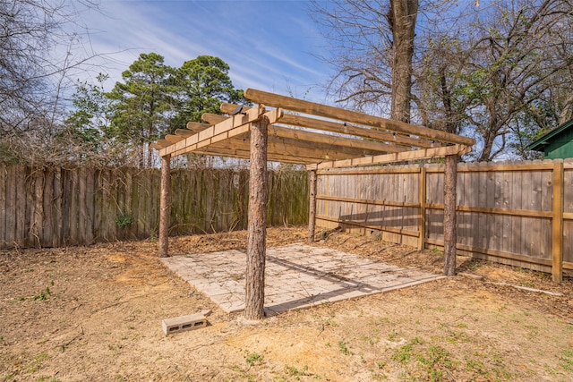 view of yard with a patio area, a fenced backyard, and a pergola