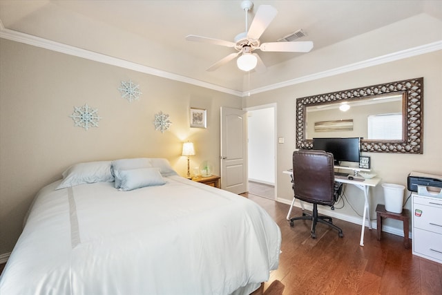 bedroom featuring crown molding, visible vents, a ceiling fan, wood finished floors, and baseboards