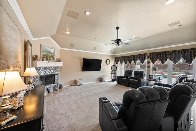 carpeted living room featuring baseboards, visible vents, ornamental molding, vaulted ceiling, and a fireplace