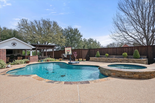 view of swimming pool with a patio area, a fenced backyard, a fenced in pool, and an in ground hot tub