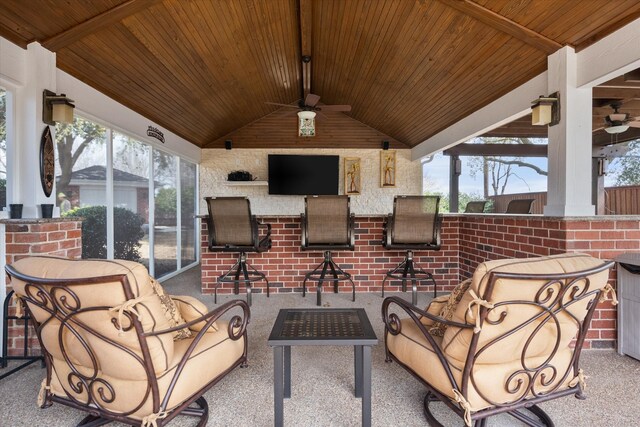 view of patio / terrace featuring outdoor wet bar