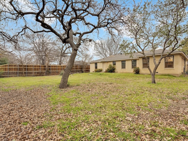 view of yard with fence