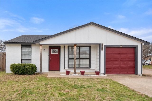 single story home with concrete driveway, a porch, an attached garage, a front lawn, and brick siding