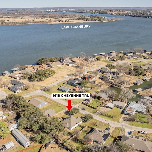 aerial view featuring a water view and a residential view