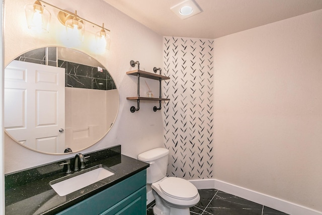 full bath featuring toilet, vanity, baseboards, marble finish floor, and walk in shower