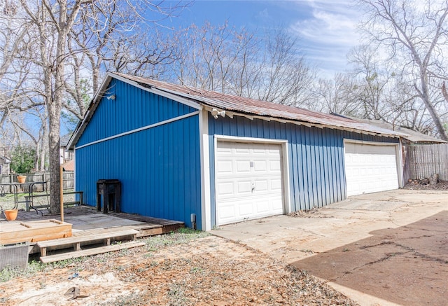 detached garage with fence