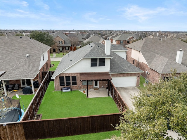 birds eye view of property with a residential view