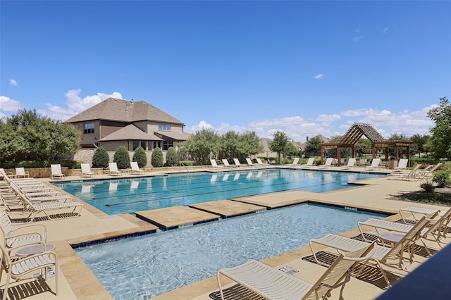 pool with a gazebo and a patio